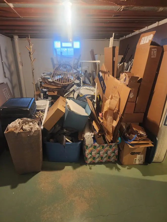 Roll-off dumpster container at job site for 4 Yard Dumpster Rental in Brooksville